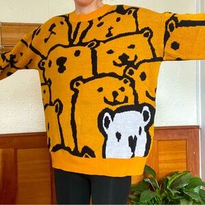 Cute yellow polar bear sweater.